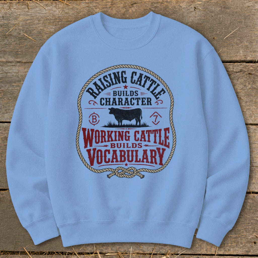 Light blue sweatshirt with "Raising Cattle Builds Character" and "Working Cattle Builds Vocabulary" text.