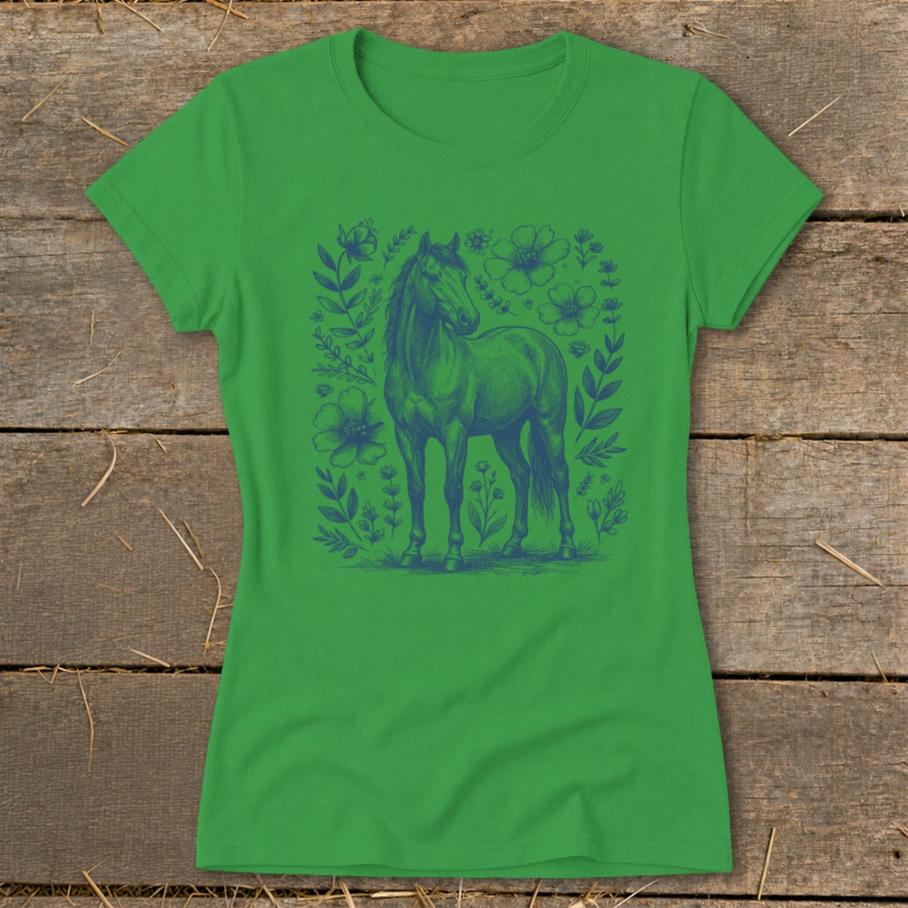 Green t-shirt with blue horse and floral design.