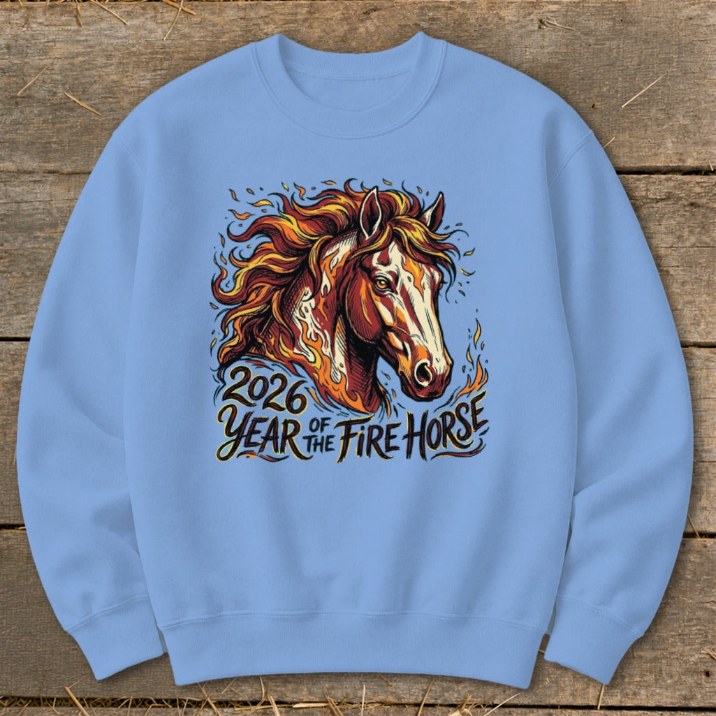 Light blue sweatshirt featuring a fiery horse graphic and "2026 Year of the Fire Horse" text.