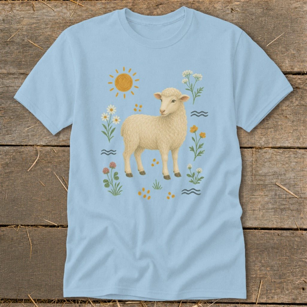 Light blue t-shirt with a cream sheep surrounded by flowers and a sun.