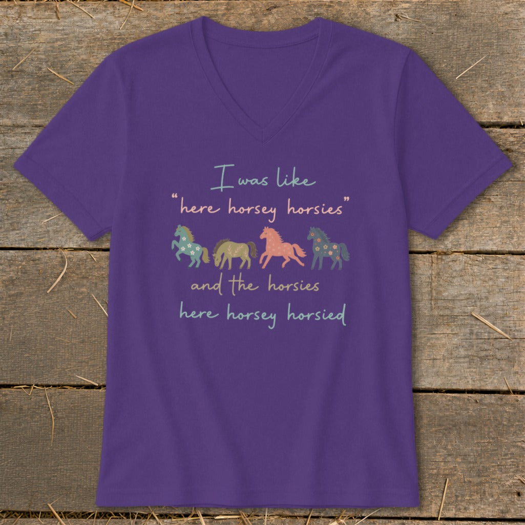 Purple t-shirt with "I was like "here horsey horsies" and the horsies here horsey horsied" and horse illustrations.