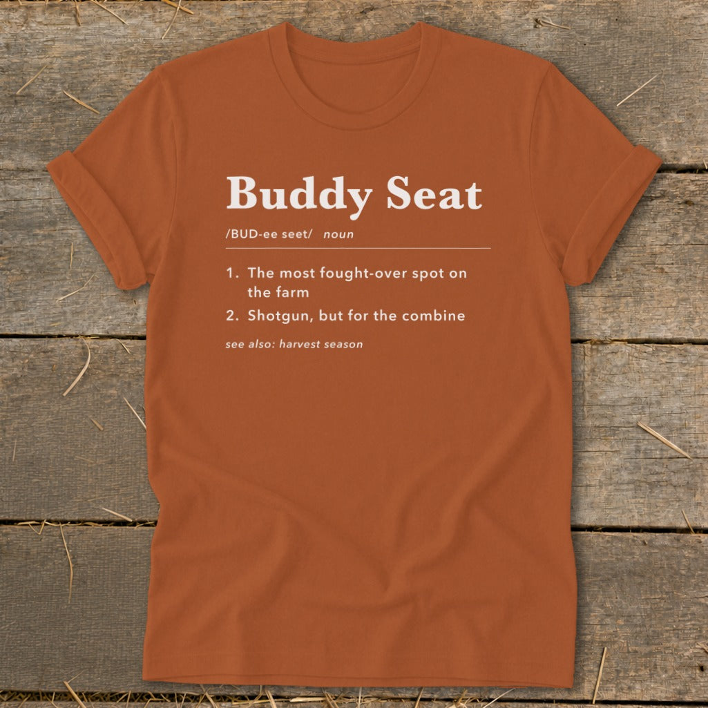 Orange t-shirt with "Buddy Seat" definition and "harvest season" reference.
