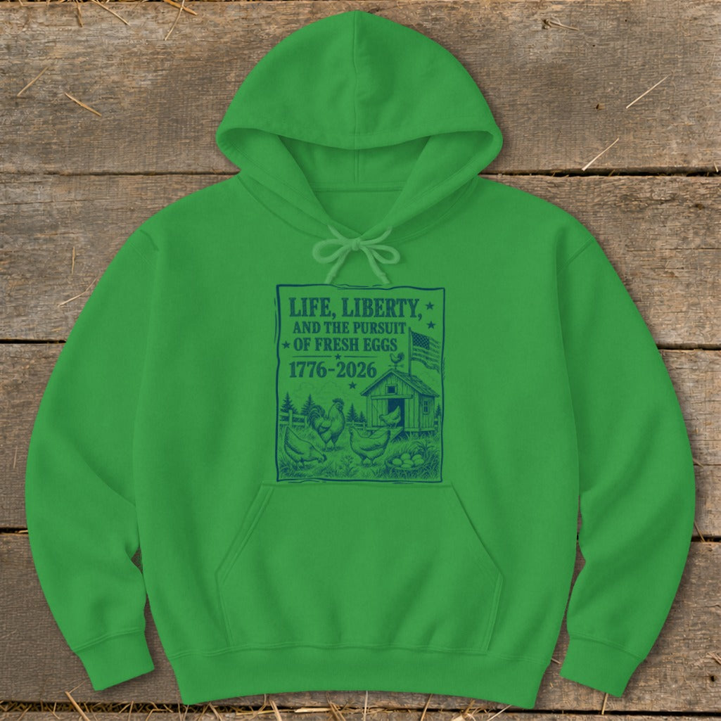 Green hoodie with blue graphic featuring chickens, a coop, and text about "fresh eggs".