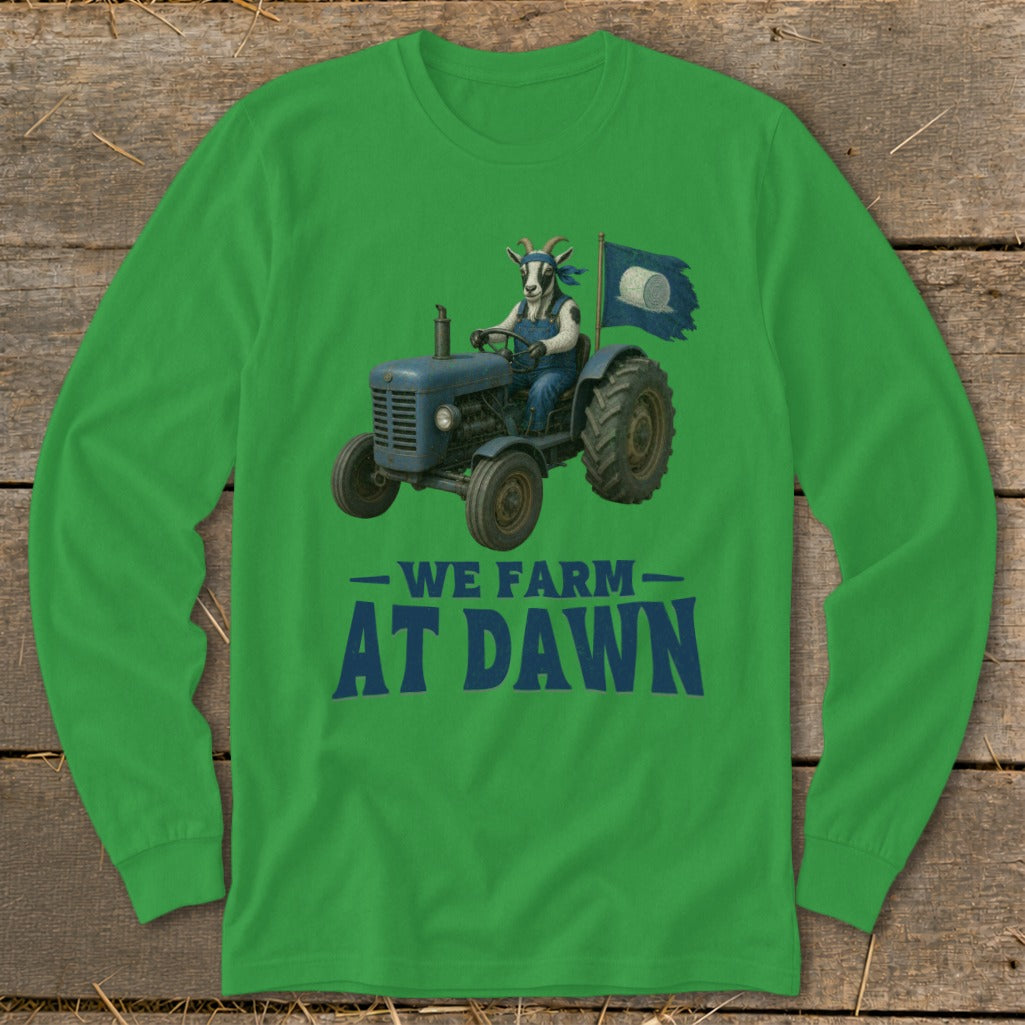 Goat in overalls drives blue tractor, flying flag, text reads "WE FARM AT DAWN".