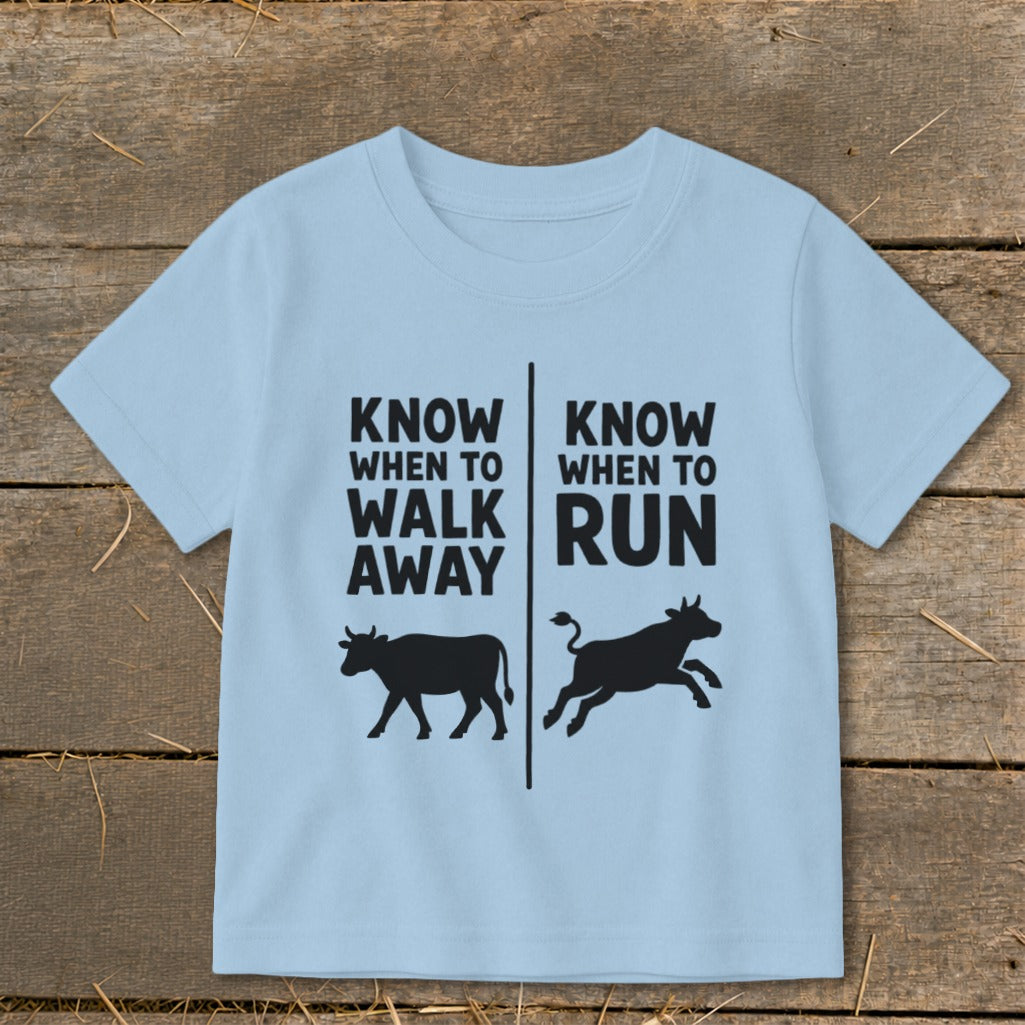 Light blue t-shirt with "KNOW WHEN TO WALK AWAY" and a walking cow.