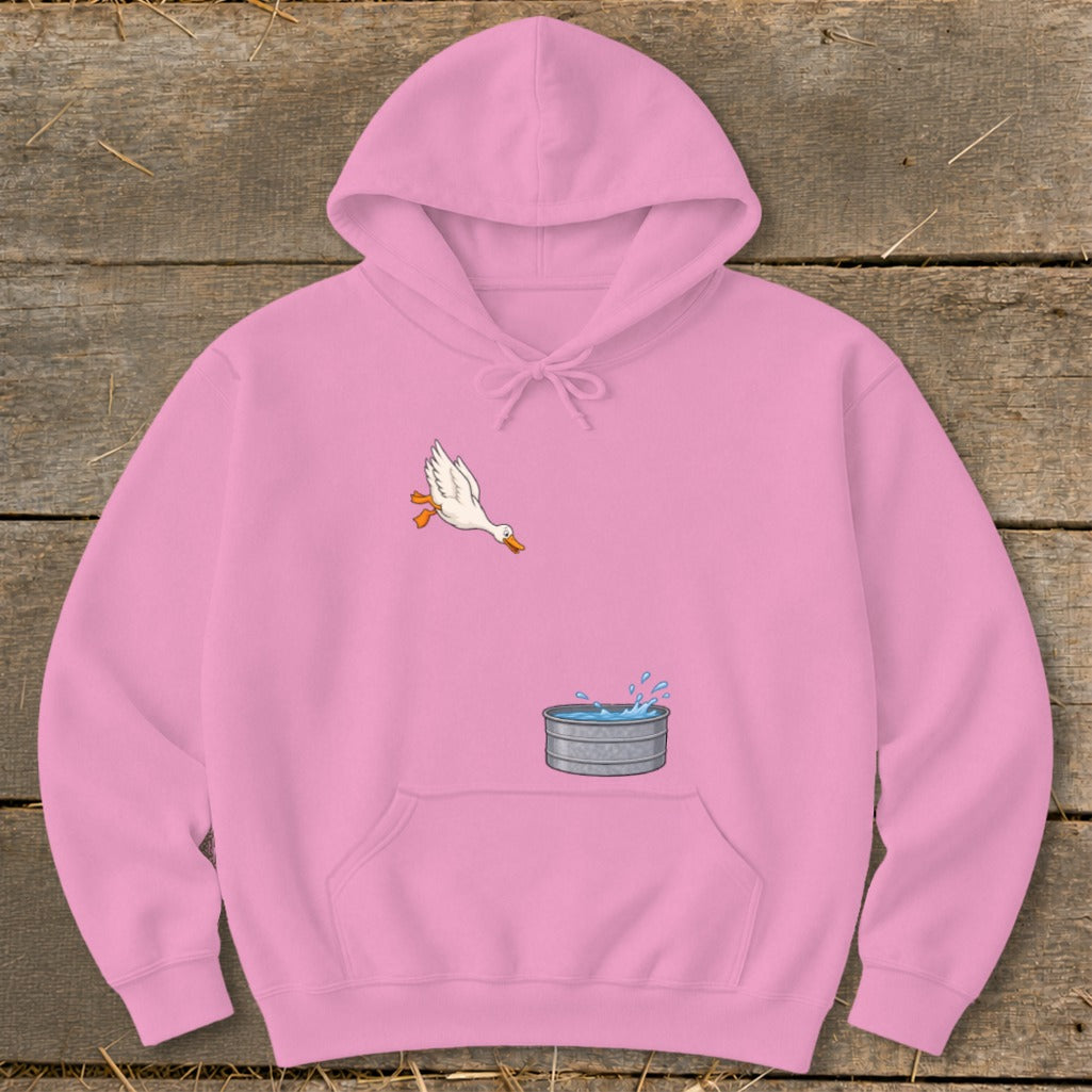 Pink hoodie with cartoon duck leaping into a galvanized water tub graphic.