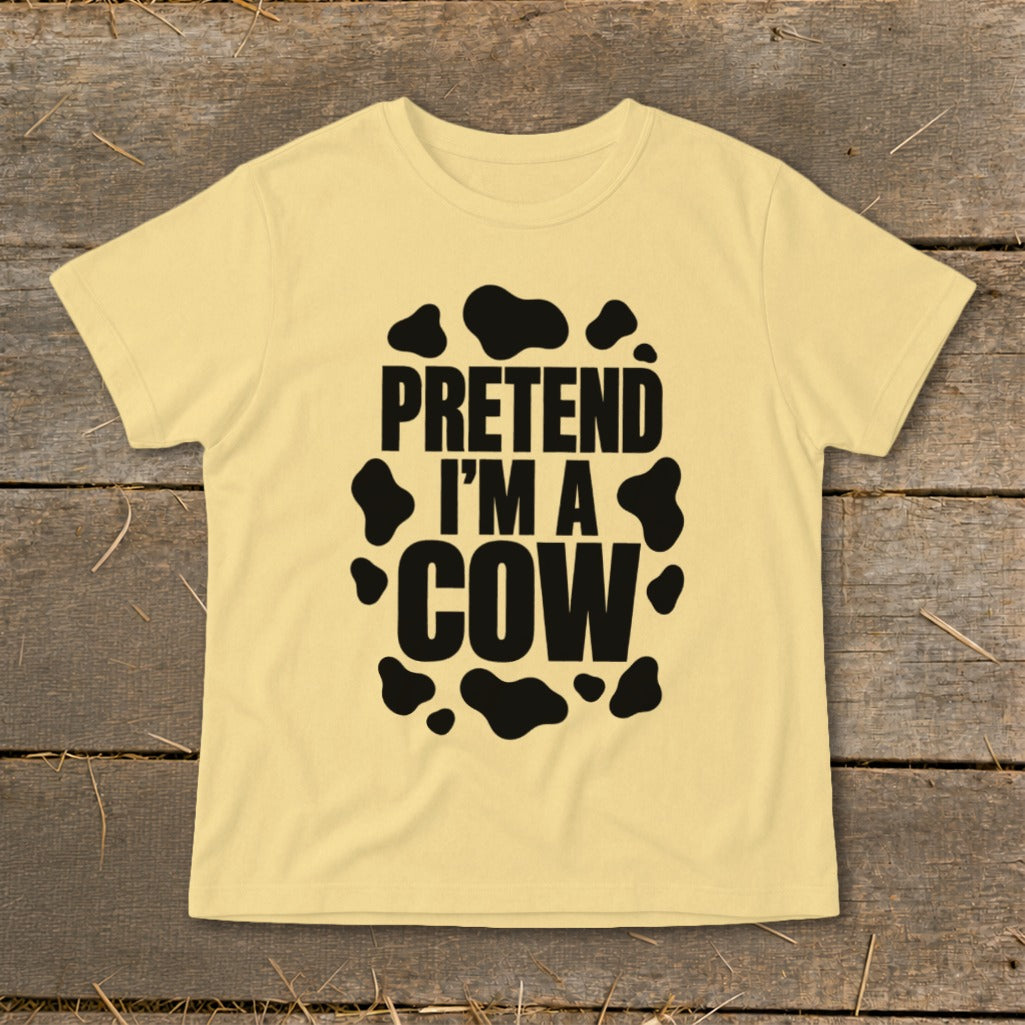 Yellow t-shirt with "PRETEND I'M A COW" text and black cow spots.