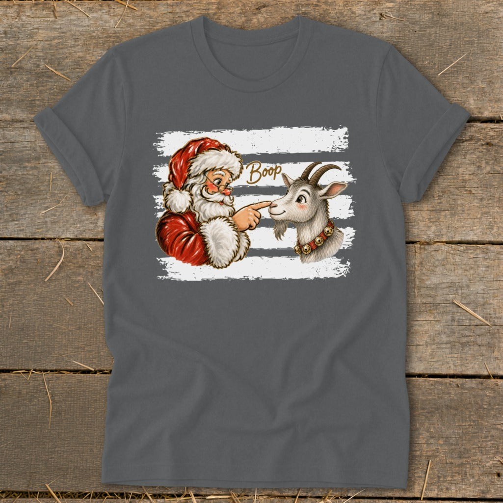Santa points at a goat's nose with the word "Boop" above.