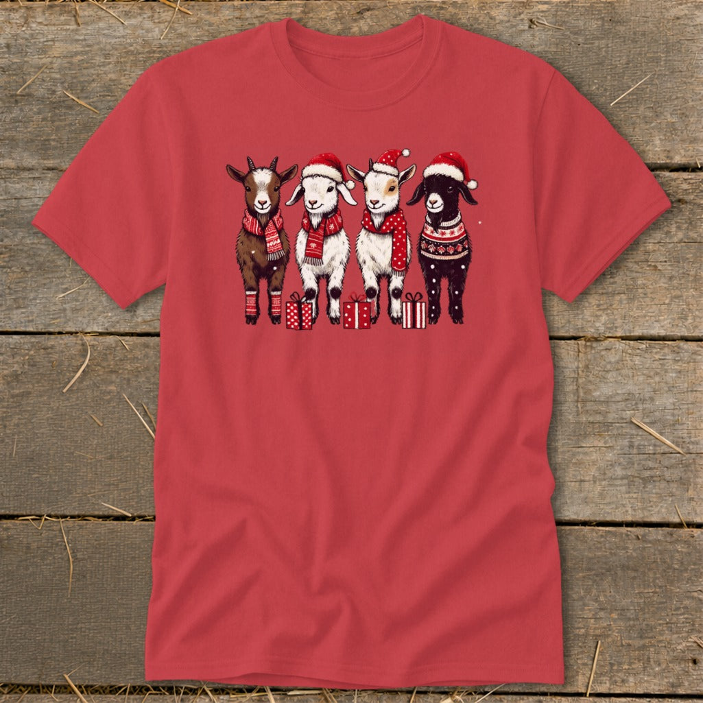 Four goats wearing Santa hats and scarves with Christmas presents.