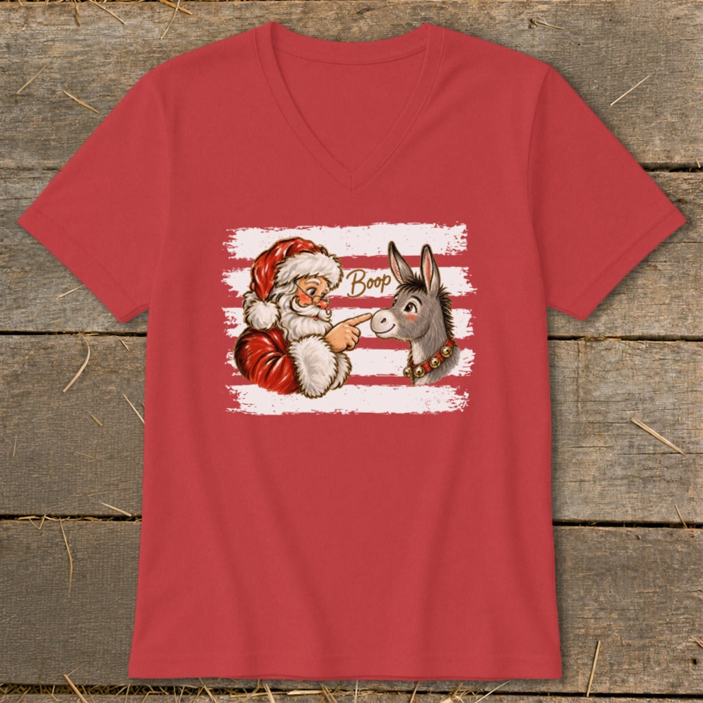 Santa pointing at donkey with "Boop" text on a red t-shirt.