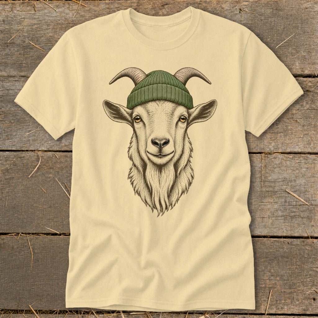 Cream t-shirt with a detailed illustration of a goat wearing a green beanie.
