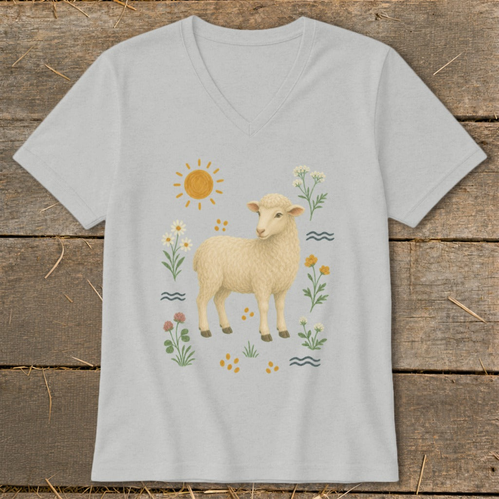 Light grey v-neck t-shirt with a watercolor illustration of a lamb surrounded by flowers and a sun.