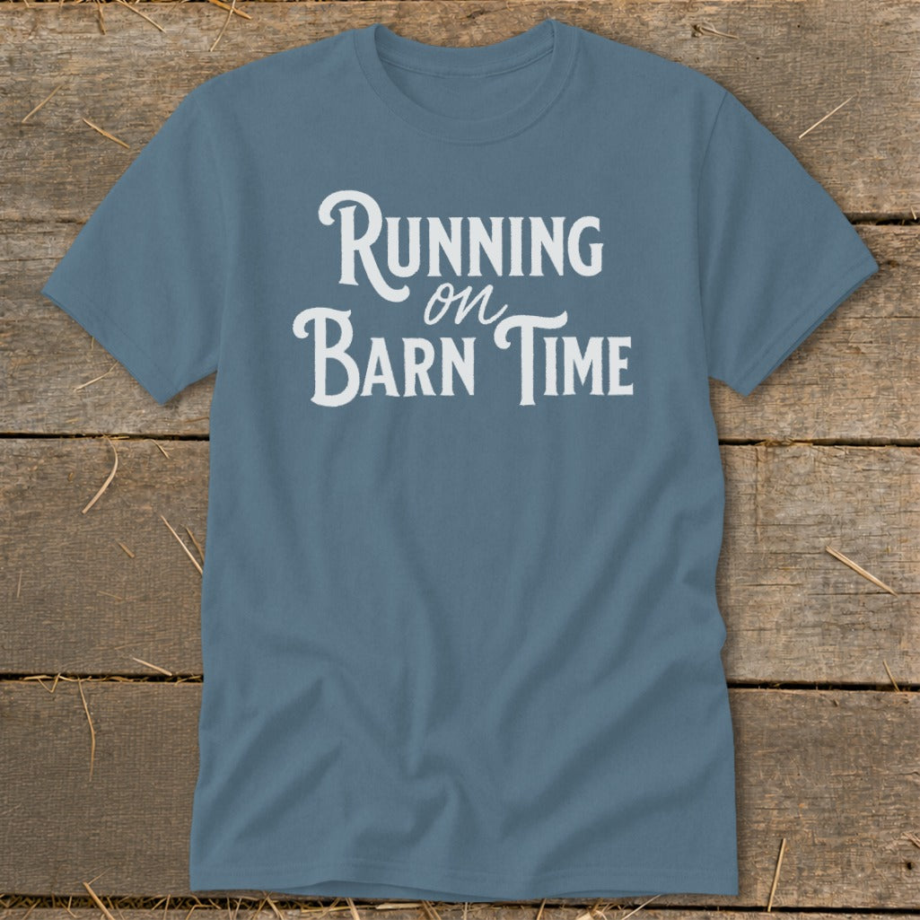 Blue t-shirt with white text that reads "Running on Barn Time."