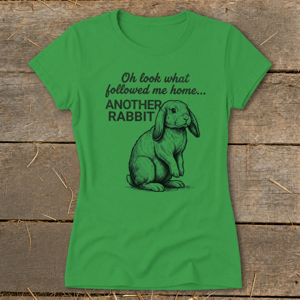 Green t-shirt with "Oh look what followed me home... ANOTHER RABBIT" text and a rabbit illustration.