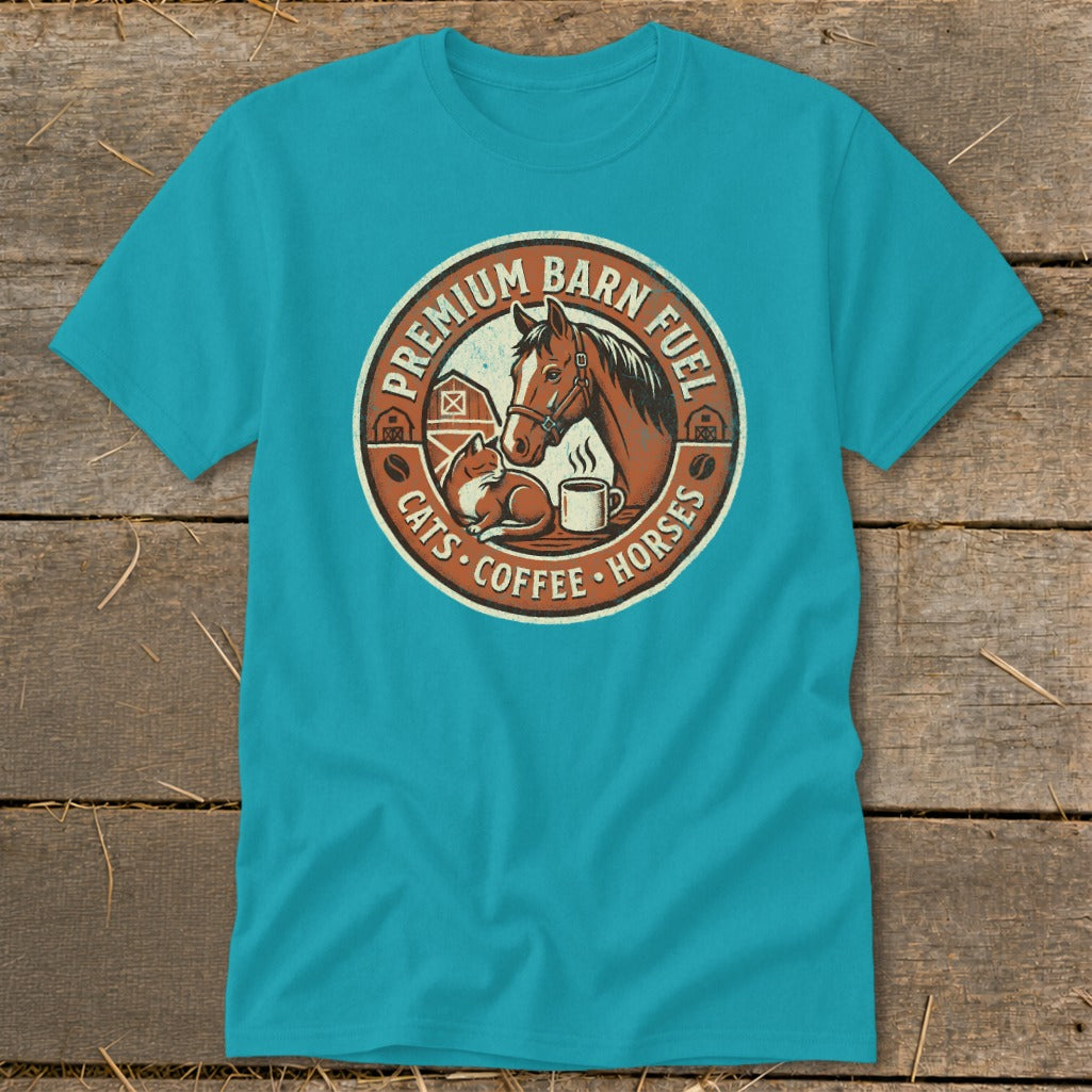 Teal t-shirt with circular barnyard graphic featuring horse, cat, coffee, and barn.