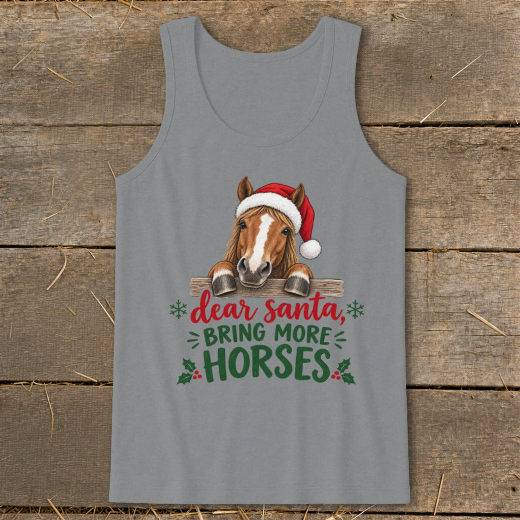 A grey tank top featuring a graphic of a horse wearing a Santa hat behind a wooden fence with text reading Dear Santa, Bring More Horses.