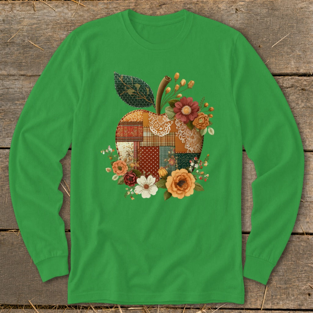 Green long-sleeve shirt with a patchwork apple graphic adorned with flowers.