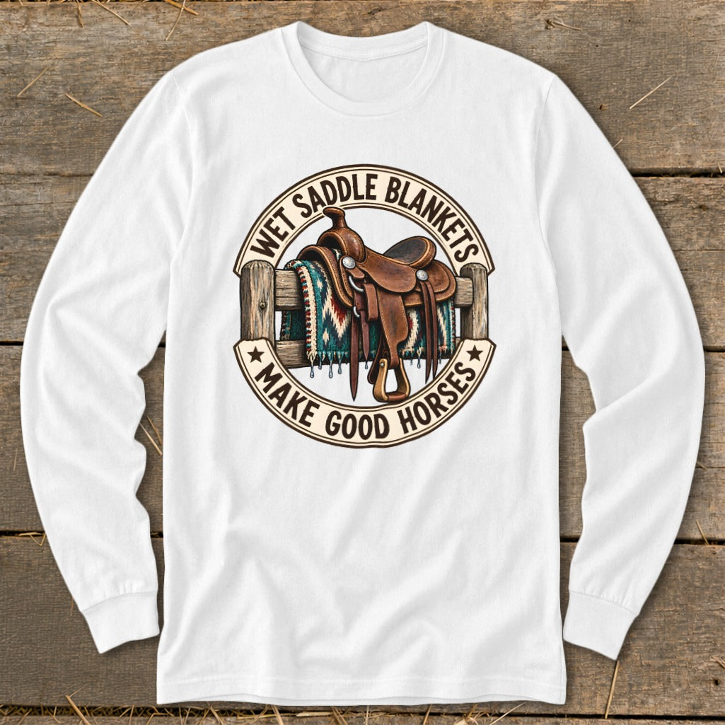 Saddle on fence with text "Wet Saddle Blankets Make Good Horses".