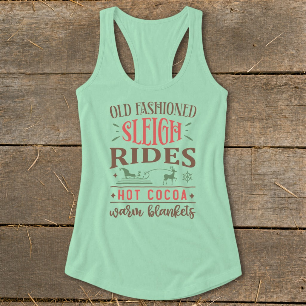Light mint tank top with "Old Fashioned Sleigh Rides, Hot Cocoa, Warm Blankets" text.