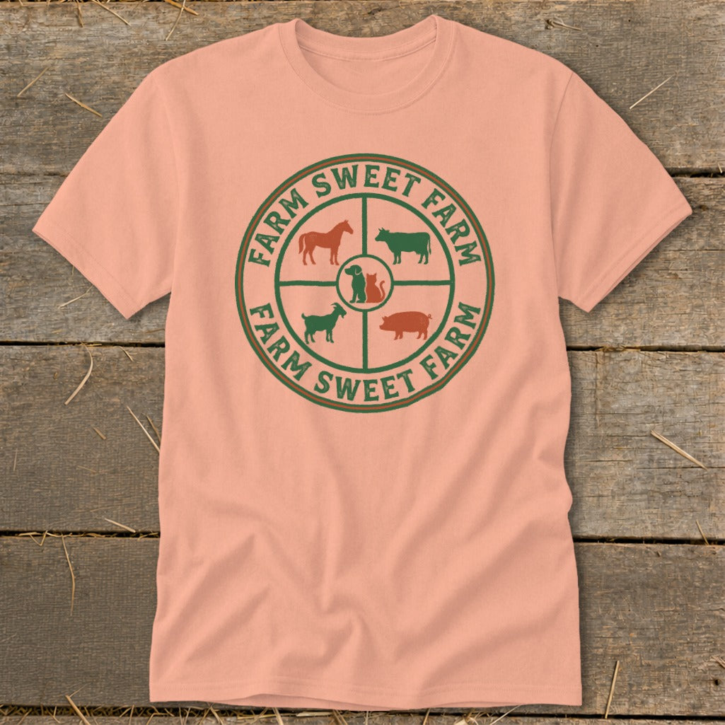 Peach t-shirt with circular "Farm Sweet Farm" design and farm animals.