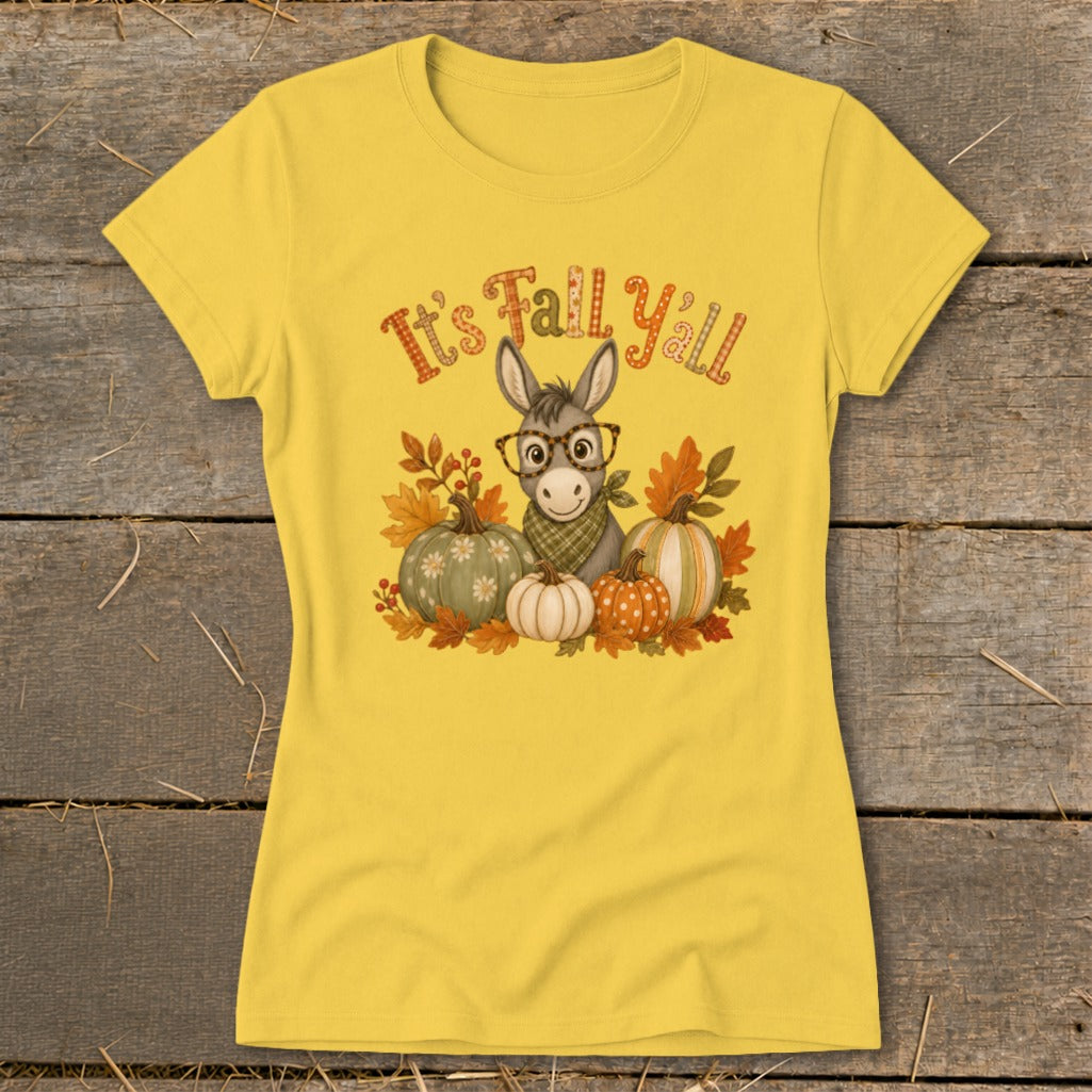 Yellow t-shirt with a donkey wearing glasses and bandana, surrounded by pumpkins and fall leaves, saying "It's Fall Y'all".