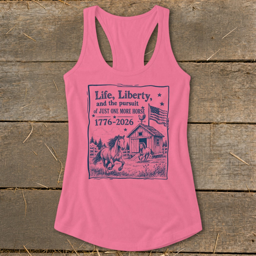 Pink tank top with "Life, Liberty, and the pursuit of JUST ONE MORE HORSE 1776-2026" graphic.