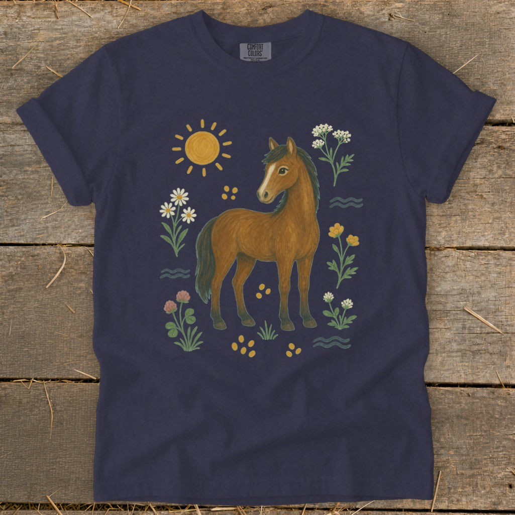 Navy t-shirt with a brown horse surrounded by flowers and a sun graphic.