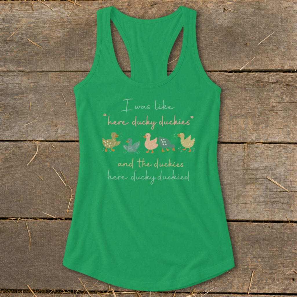 Green tank top with cartoon ducks and text: "I was like "here ducky duckies" and the duckies here ducky duckied."
