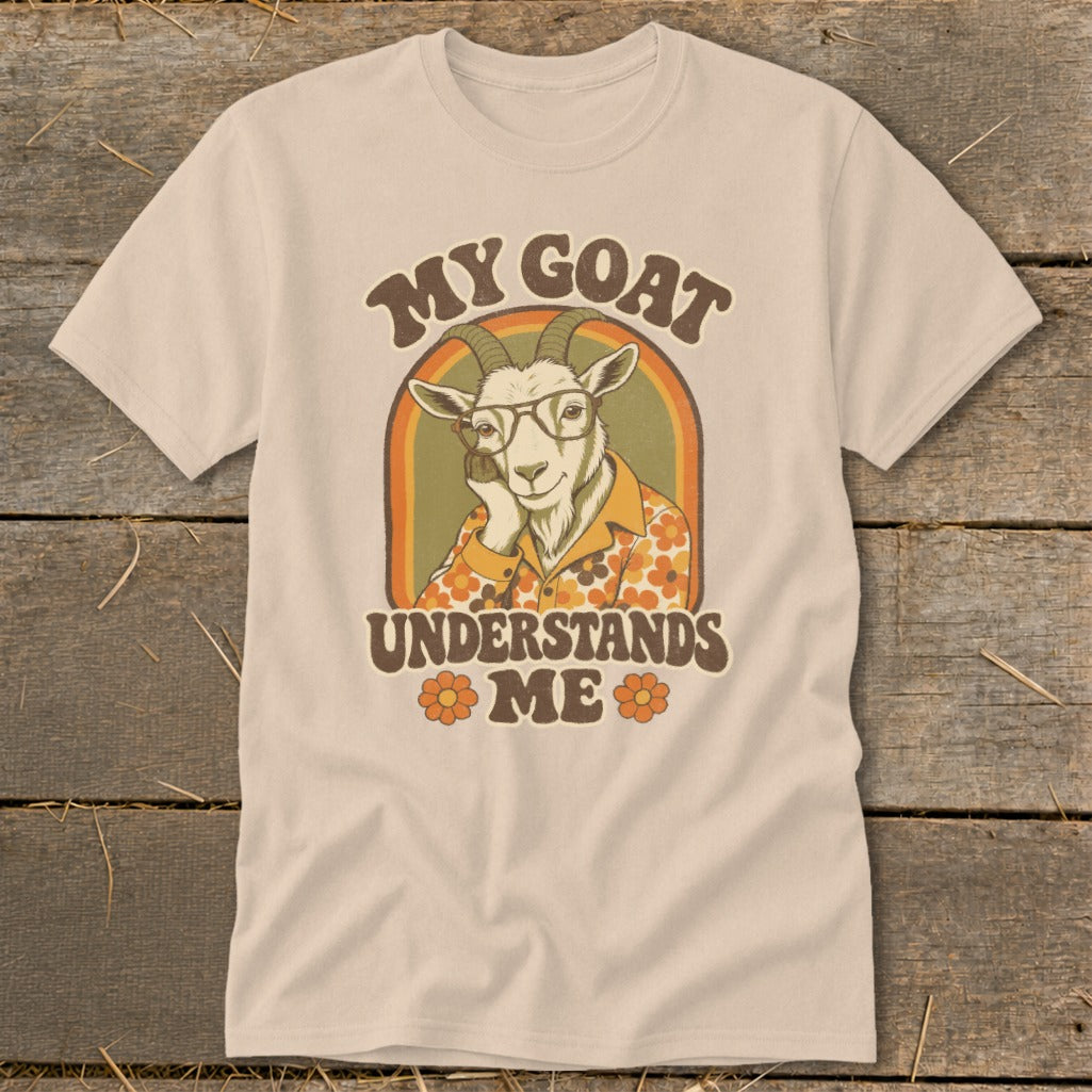 T-shirt graphic with a goat wearing glasses and a floral shirt, text reads "MY GOAT UNDERSTANDS ME".