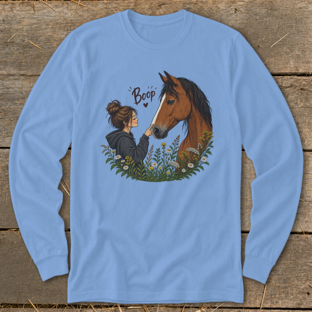 Illustration of a girl booping a horse's nose with flowers and text "Boop."
