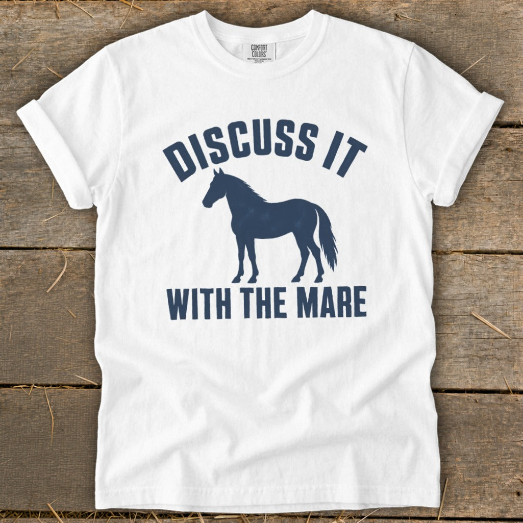 White t-shirt with navy graphic "DISCUSS IT WITH THE MARE" and horse silhouette.