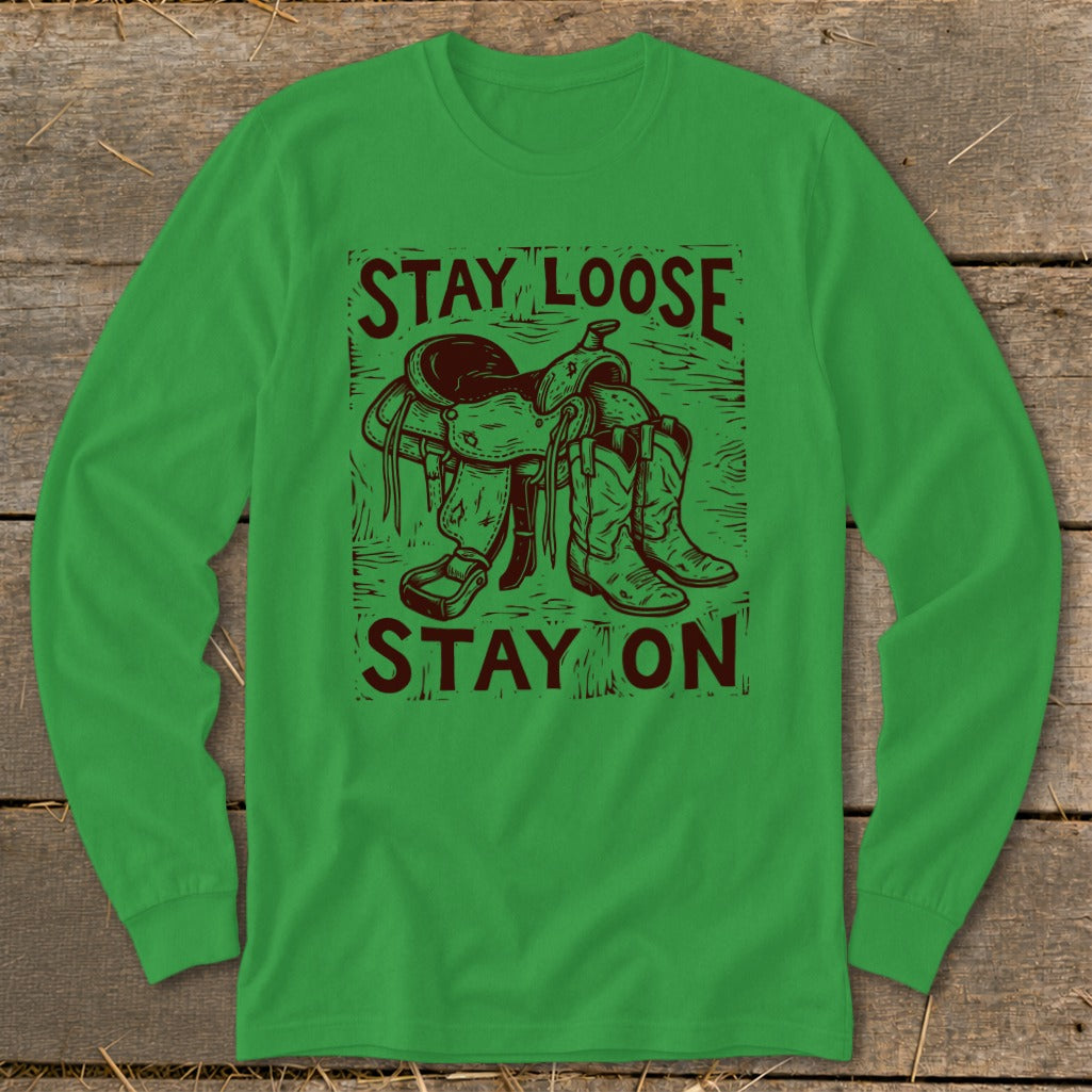 Green long-sleeve shirt with a saddle, boots, and the text "STAY LOOSE STAY ON".