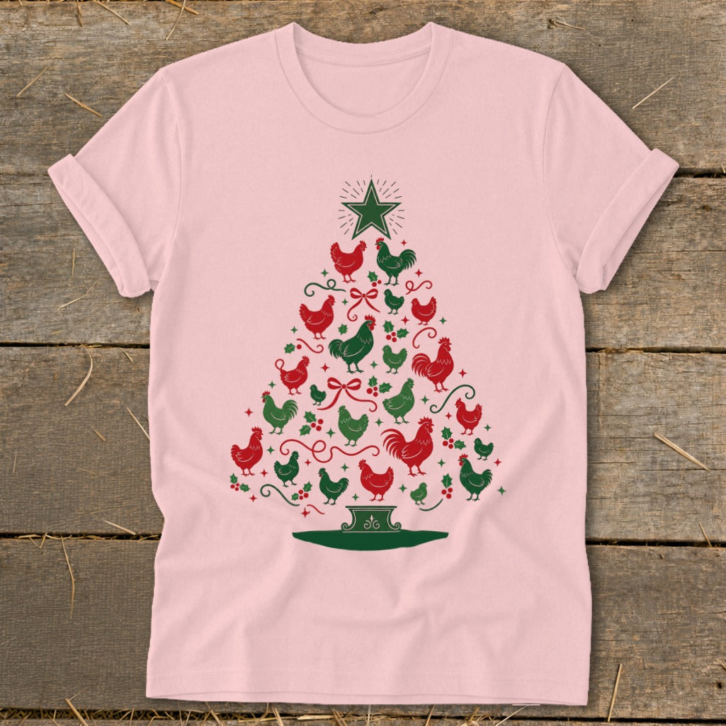 Pink t-shirt with a Christmas tree shape made of red and green chickens and holly.