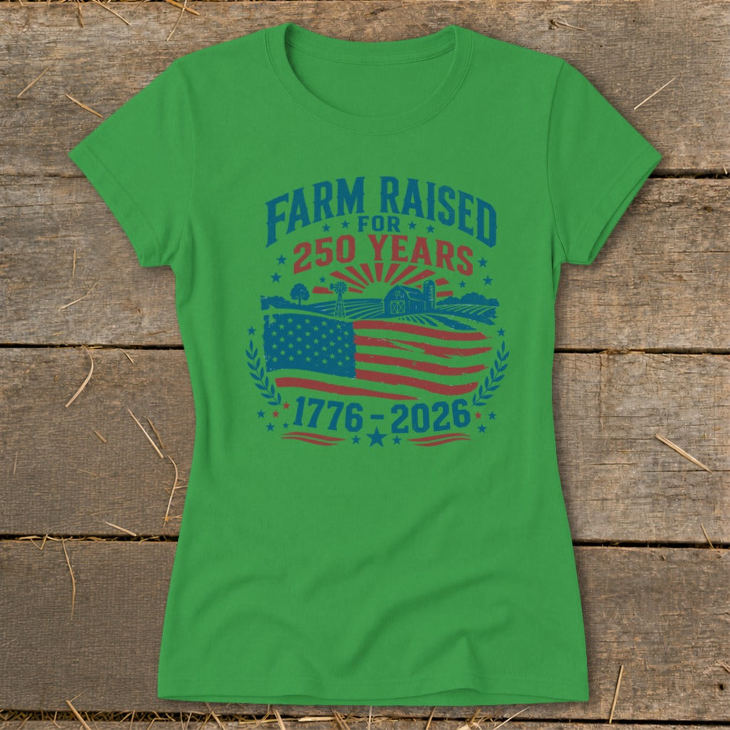 Green t-shirt with "Farm Raised for 250 Years" and an American flag with farm scene, 1776-2026.