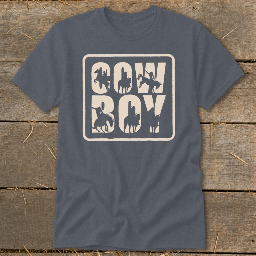 Grey t-shirt with "COW BOY" text featuring silhouettes of cowboys on horses.