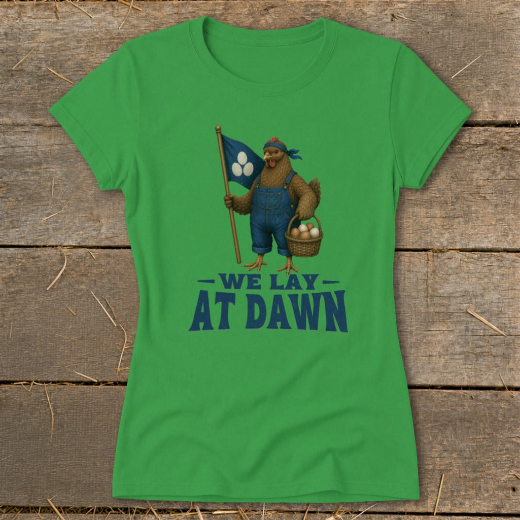 Chicken in overalls holding flag and basket, text "WE LAY AT DAWN".