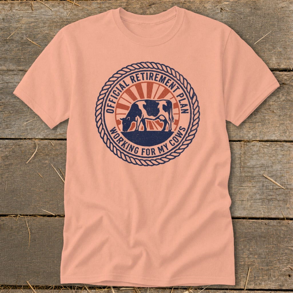 Peach t-shirt with "Official Retirement Plan Working For My Cows" graphic.