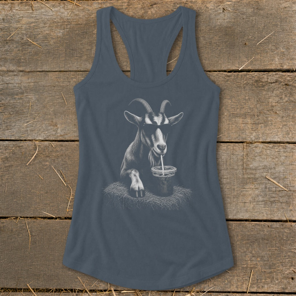Goat wearing sunglasses drinks from a straw on a tank top.