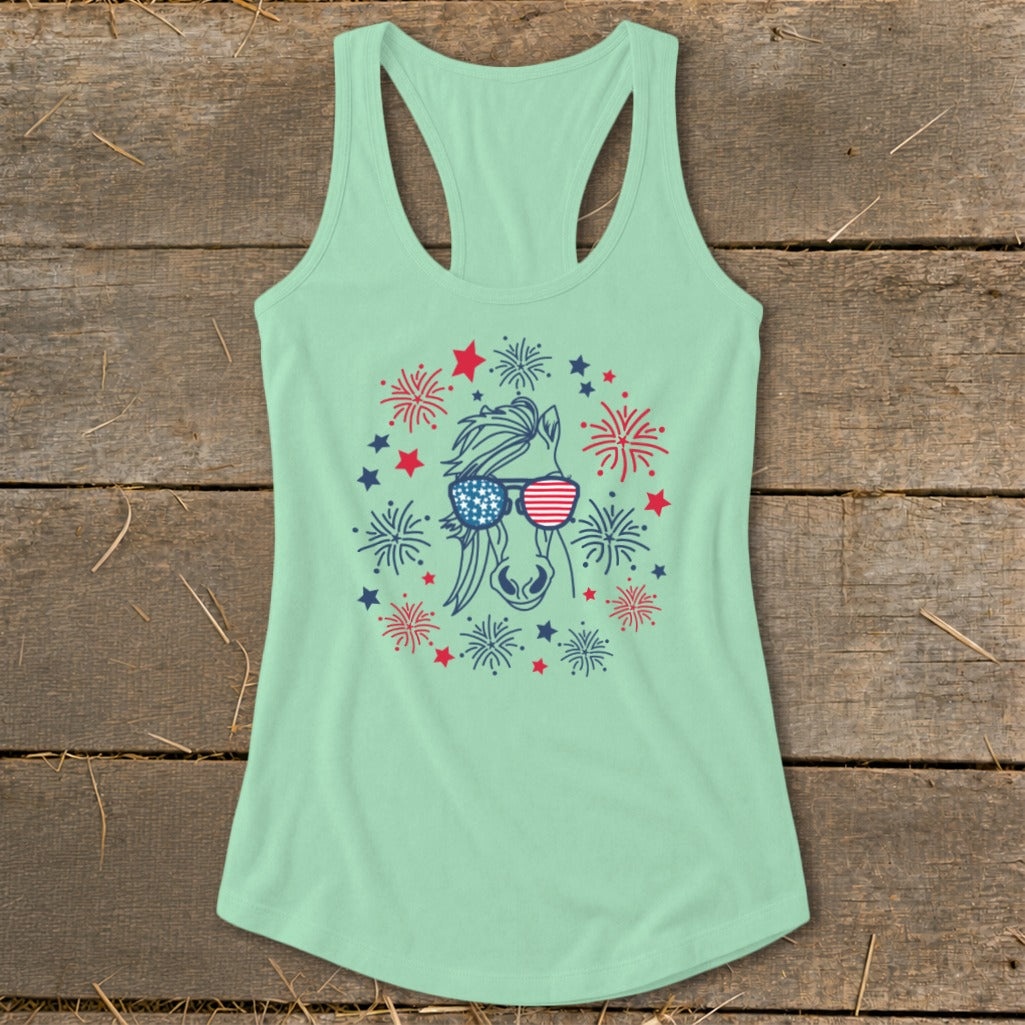 Mint green tank top with a horse wearing sunglasses and surrounded by fireworks.