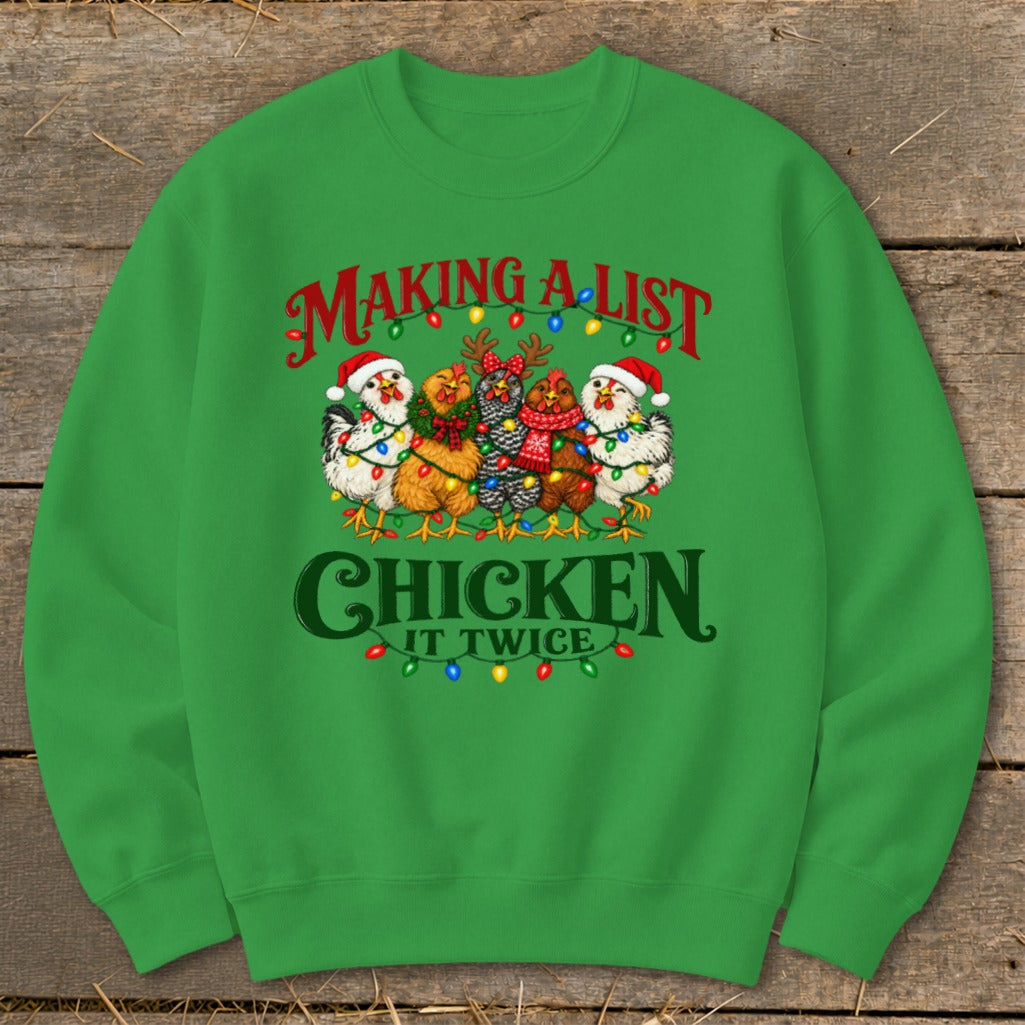 Green sweatshirt with chickens wearing Santa hats and Christmas lights, saying "Making a list, Chicken it twice."