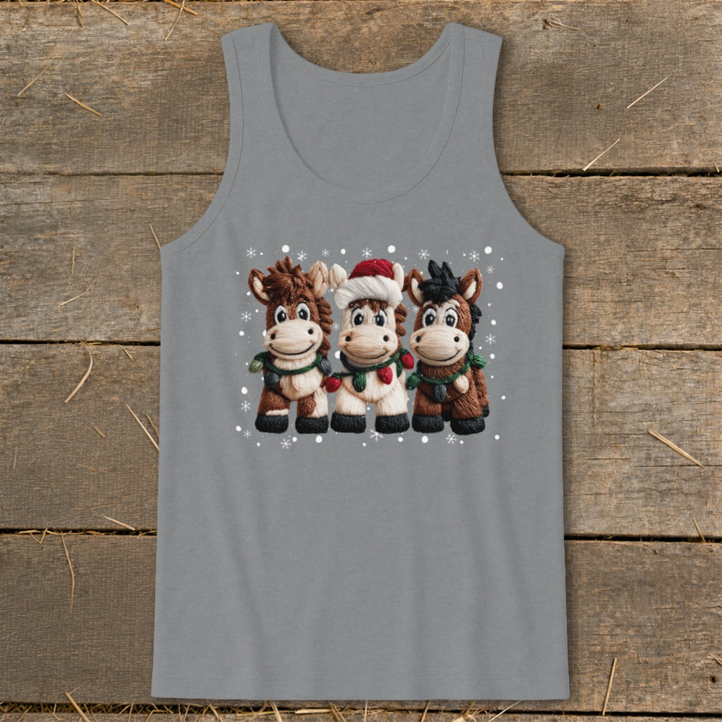 Three cartoon horses in winter attire, with one wearing a Santa hat.