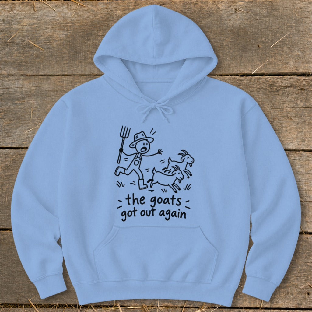 Light blue hoodie with a cartoon farmer chasing goats, text "the goats got out again".