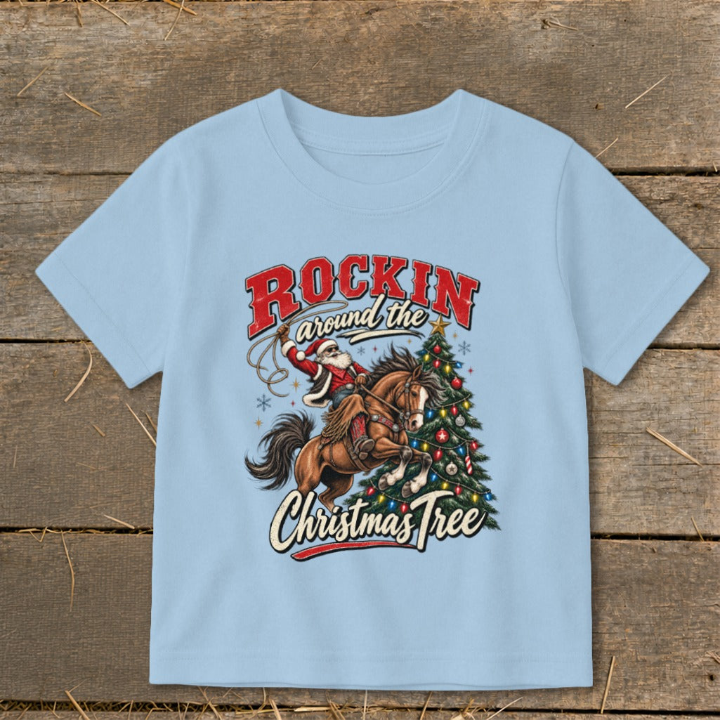 Santa riding a horse by a Christmas tree with text "Rockin around the Christmas Tree".