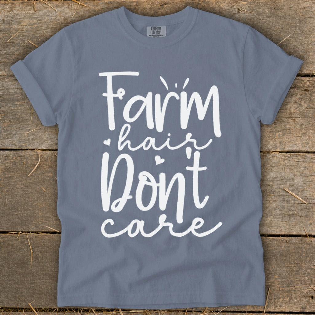 Blue Comfort Colors t-shirt with white text "Farm hair Don't care"