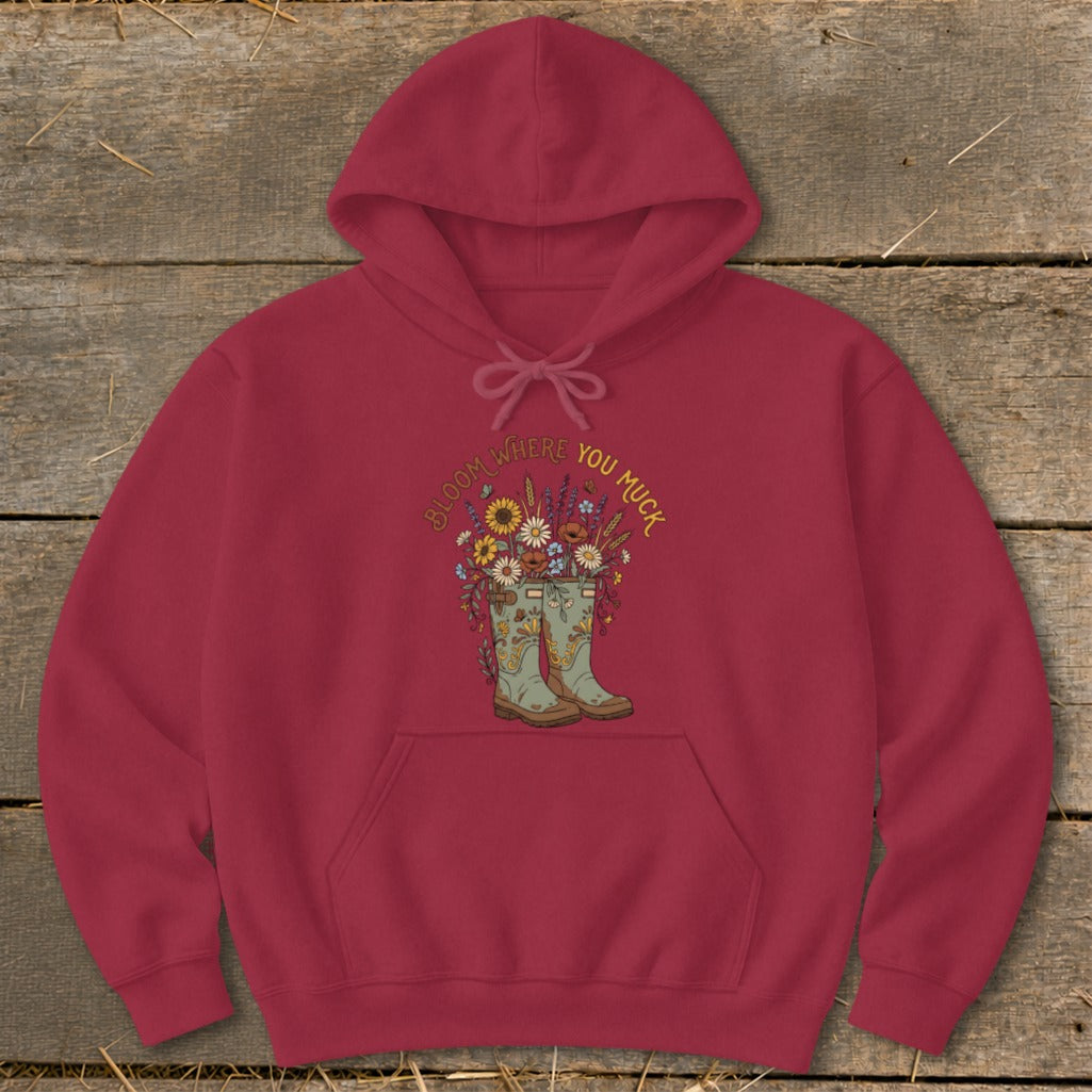 Maroon hoodie with a graphic of gardening boots overflowing with flowers and text.
