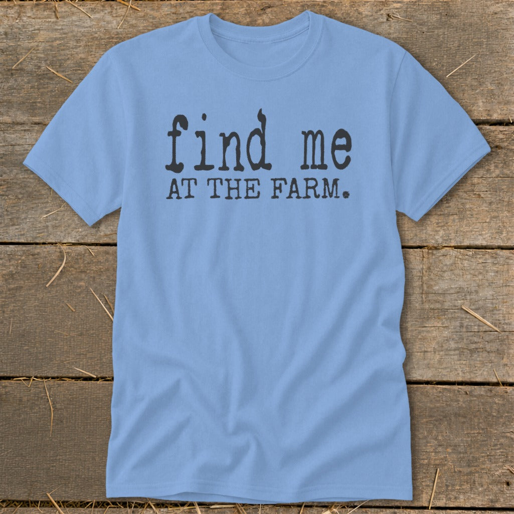 Light blue t-shirt with black text "find me AT THE FARM.".