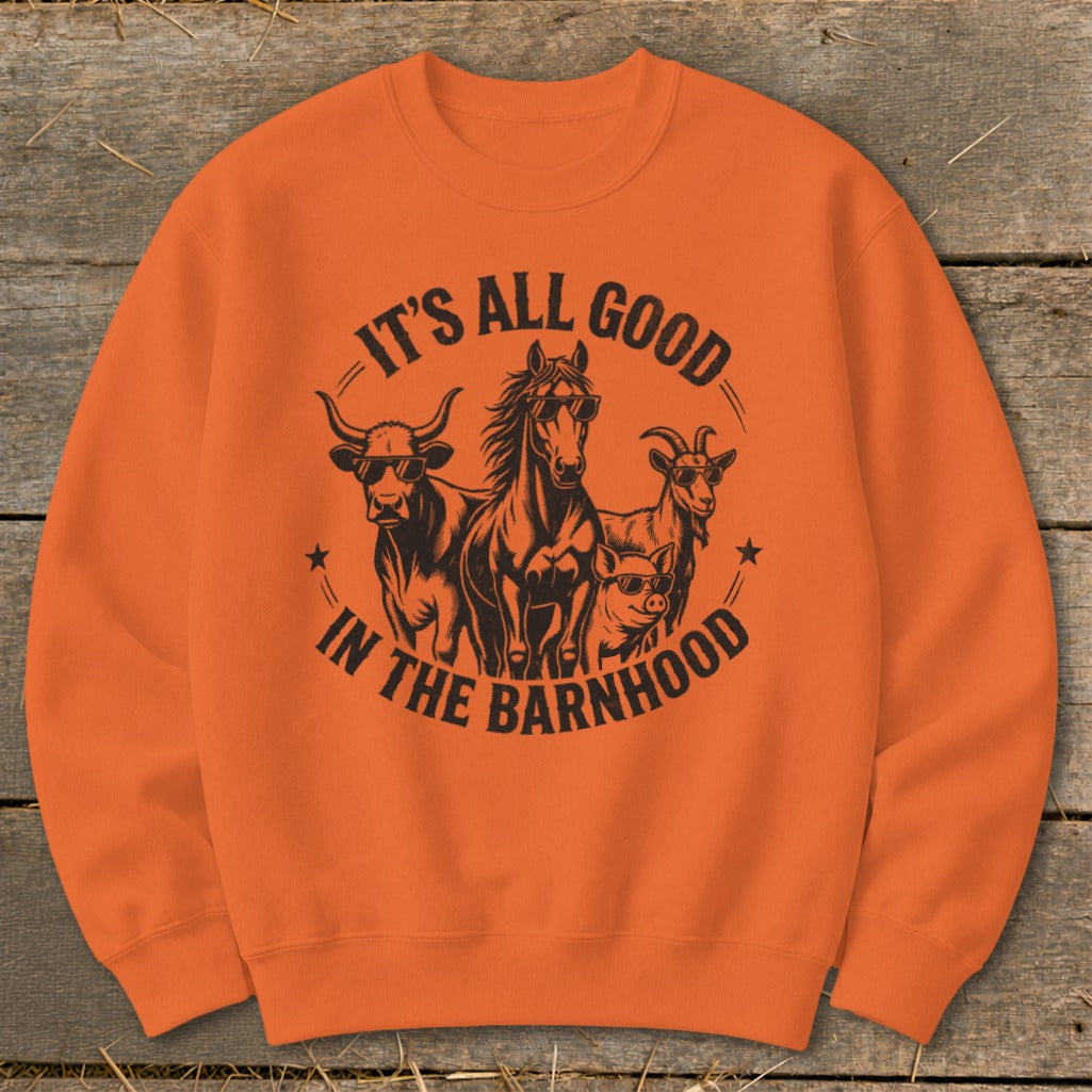 Orange sweatshirt with black graphic of farm animals wearing sunglasses and text "It's All Good In The Barnhood."