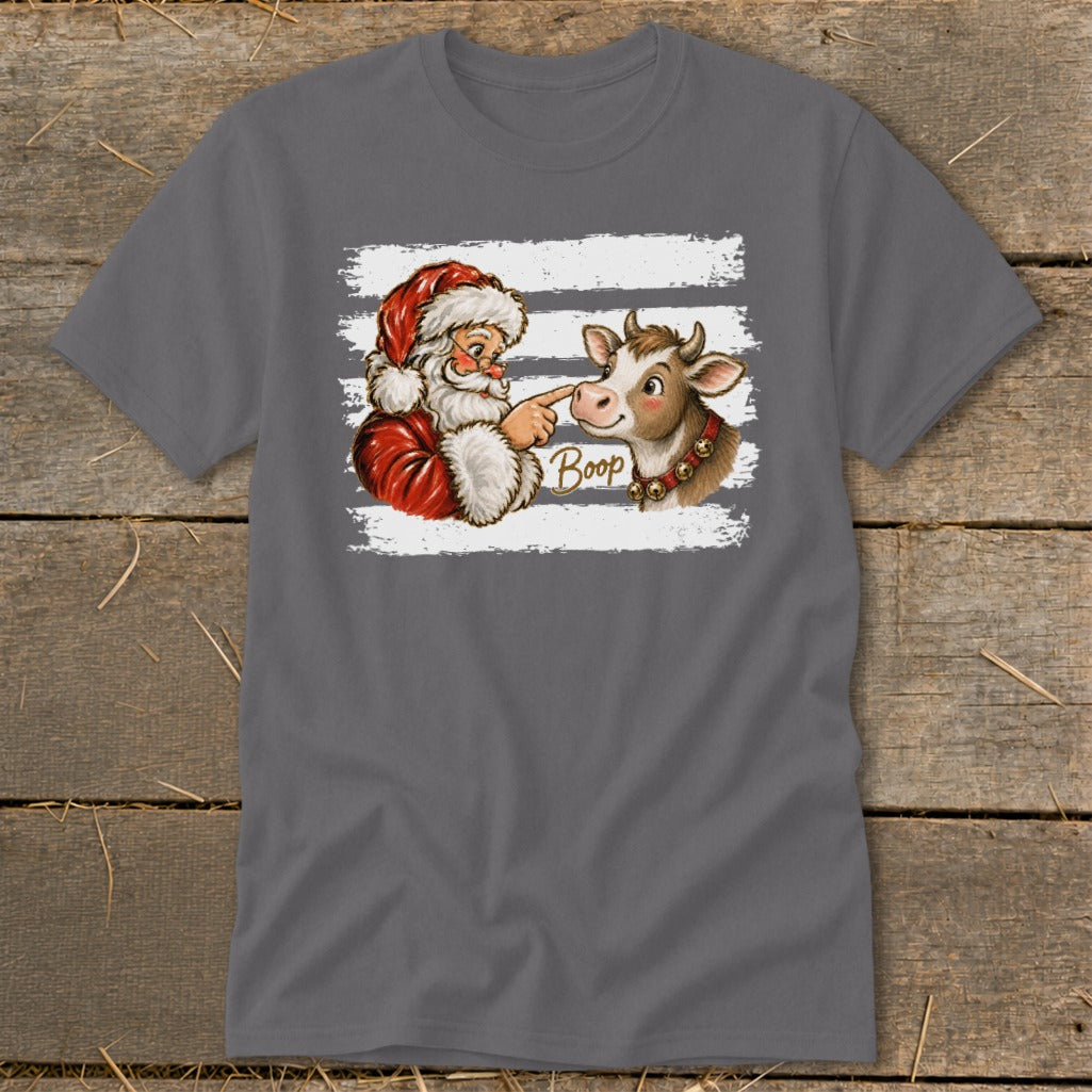 Santa boops a cow's nose with the word "Boop" on a t-shirt.