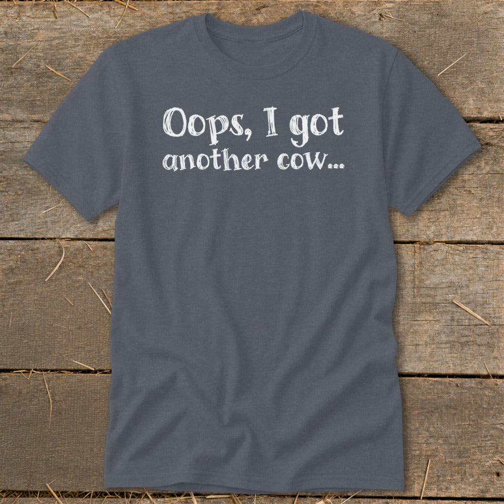 Gray t-shirt with white text that reads "Oops, I got another cow..."