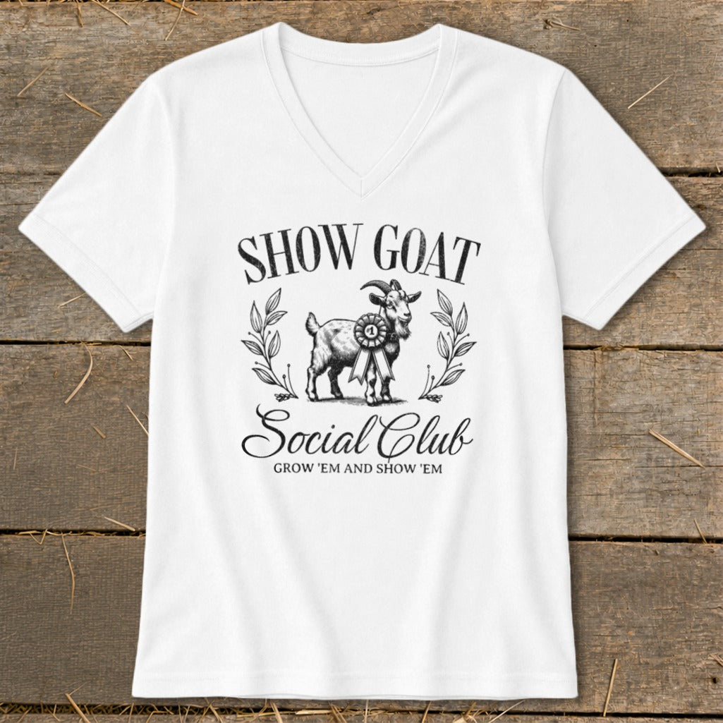 White t-shirt with "Show Goat Social Club" text and a ribbon-wearing goat graphic.